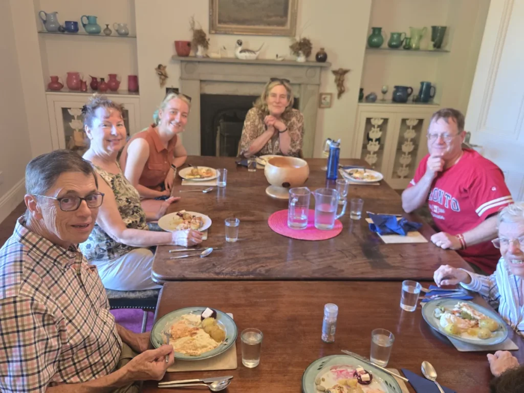 Sitting around the dining room table at Bellefield
